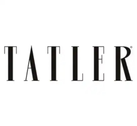 Black text spelling ’TATLER’ in an elegant serif font.